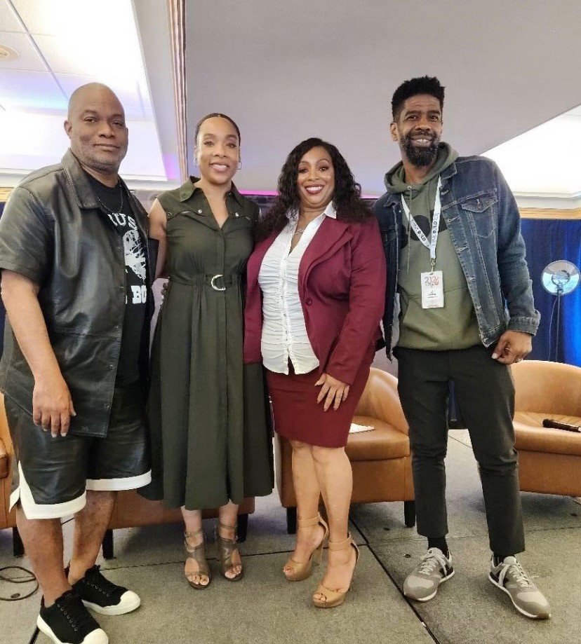 Troy and Mo with two festival guests gathered after a session at the Think Bold Festival
